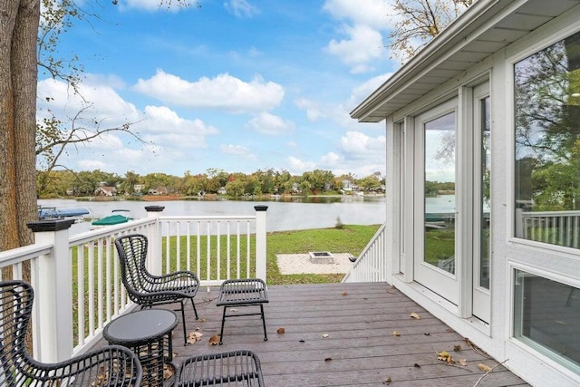 24722 84th St, Salem, WI 53168 - deck with a water view, a yard, and an outdoor fire pit