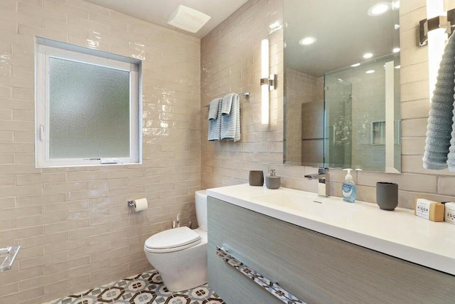 24722 84th St, Salem, WI 53168 - full bath featuring tile walls, toilet, vanity, a tile shower, and tile patterned floors