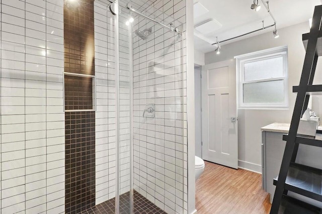24722 84th St, Salem, WI 53168 - full bathroom featuring a shower stall, toilet, wood finished floors, and vanity