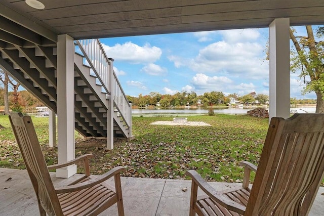 24722 84th St, Salem, WI 53168 - view of green lawn with stairway, a water view, and a patio area