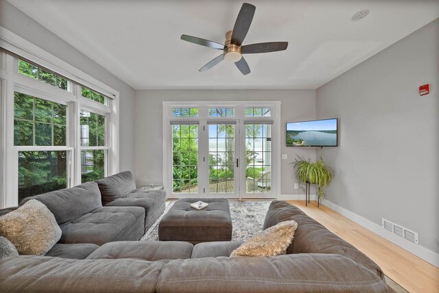 W3920 Lake Shore Dr, Lake Geneva, WI 53147 - living area with a ceiling fan, baseboards, and wood finished floors