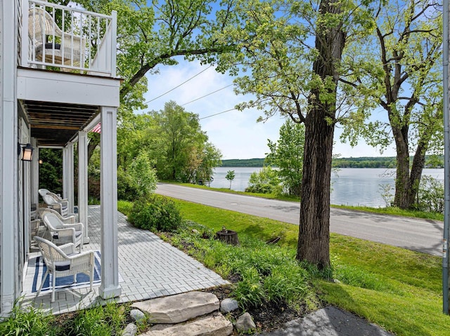 W3920 Lake Shore Dr, Lake Geneva, WI 53147 - view of patio with a water view