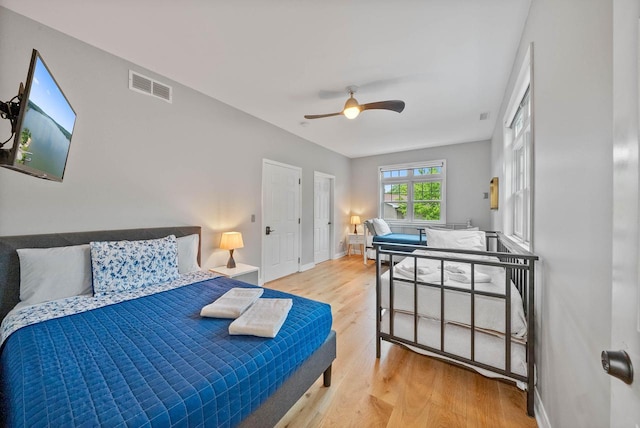 W3920 Lake Shore Dr, Lake Geneva, WI 53147 - bedroom featuring wood finished floors, ceiling fan, and baseboards