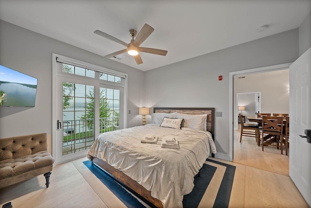 W3920 Lake Shore Dr, Lake Geneva, WI 53147 - bedroom featuring access to exterior, light wood-style flooring, and ceiling fan