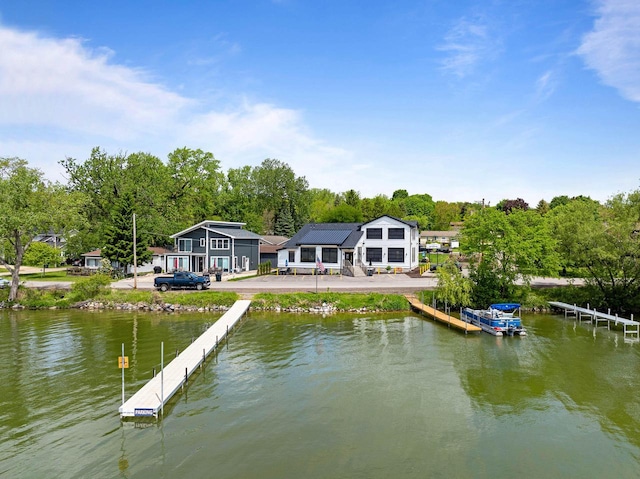 W3920 Lake Shore Dr, Lake Geneva, WI 53147 - dock area with a water view and view of wooded area