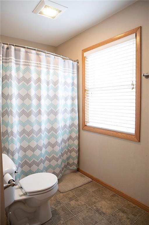 203 E Maple St, Thorp, WI 54771 - full bath featuring toilet and a shower with shower curtain