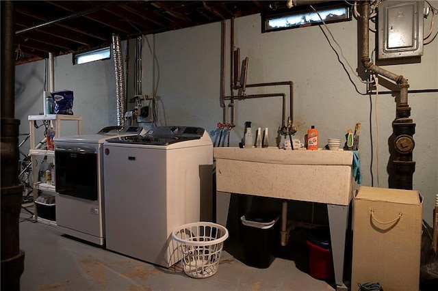 203 E Maple St, Thorp, WI 54771 - below grade area featuring washer and dryer