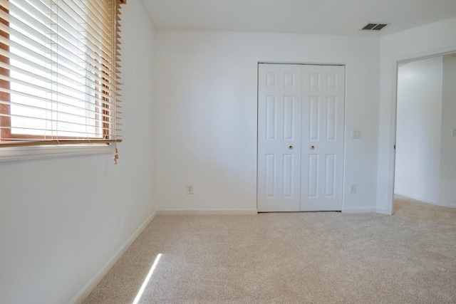 6622 96th Ave, Kenosha, WI 53142 - unfurnished bedroom with a closet, carpet, and baseboards