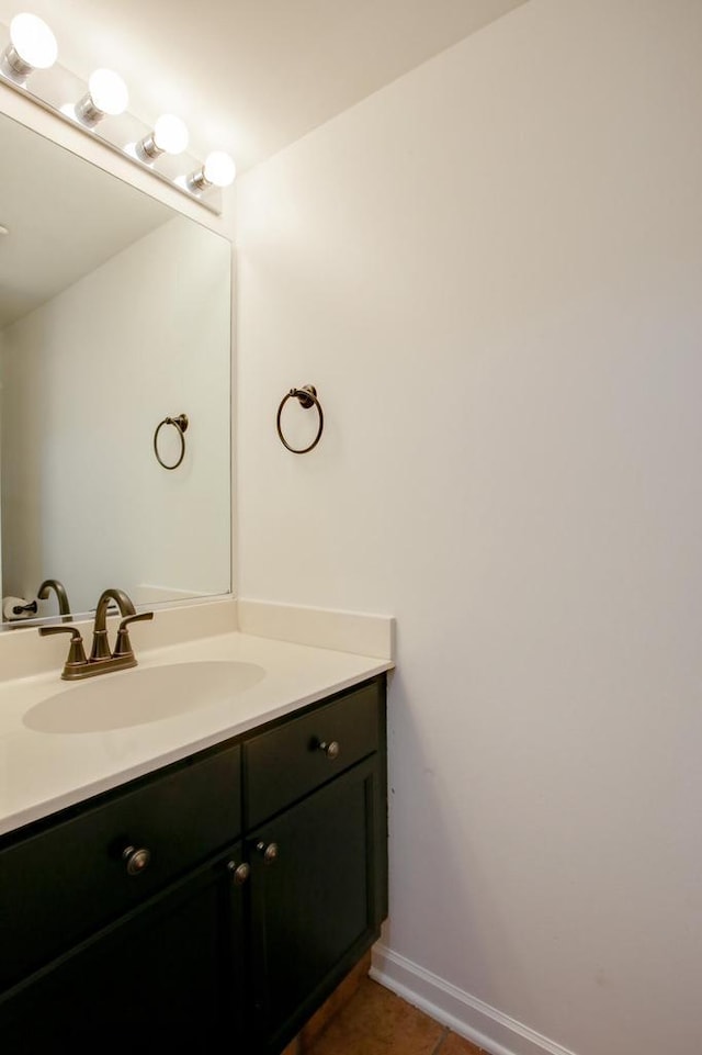 6622 96th Ave, Kenosha, WI 53142 - bathroom with vanity, tile patterned floors, and baseboards