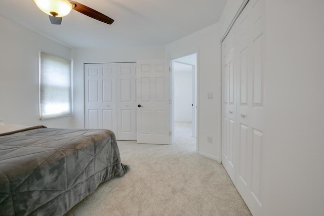 6622 96th Ave, Kenosha, WI 53142 - carpeted bedroom with two closets and a ceiling fan