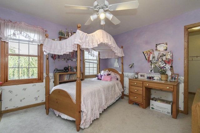 8024 W Poplar Dr, Mequon, WI 53097 - carpeted bedroom featuring ceiling fan and baseboards