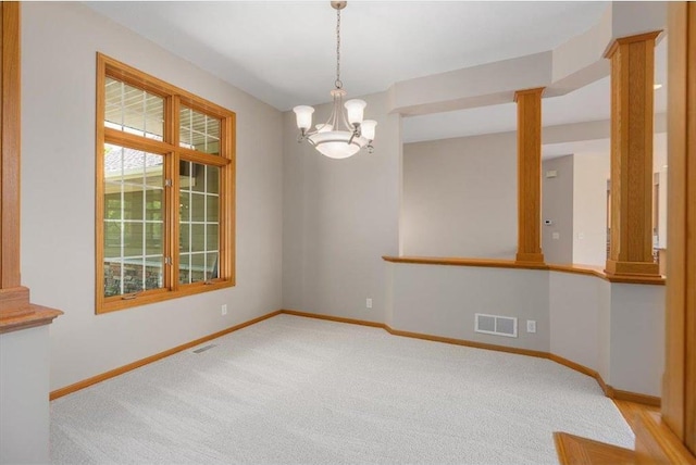 15210 Painters Lane Cir, Stillwater, MN 55082 - spare room with decorative columns, baseboards, and light carpet