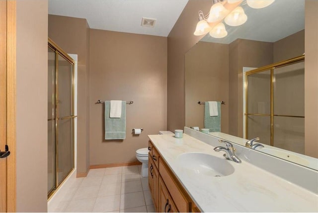 15210 Painters Lane Cir, Stillwater, MN 55082 - bathroom with toilet, a stall shower, vanity, baseboards, and tile patterned floors