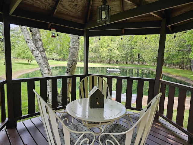9388 Alpine Rd, Fremont, WI 54940 - wooden deck with outdoor dining area and a gazebo
