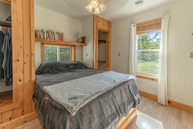 17785 Circle Dr, Boscobel, WI 53805 - bedroom featuring light wood finished floors, baseboards, and ceiling fan