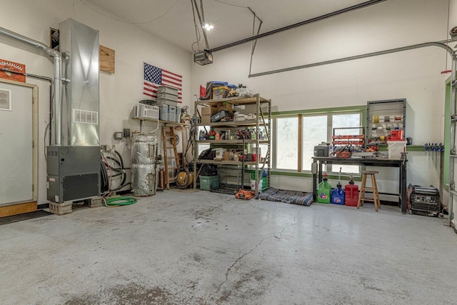 17785 Circle Dr, Boscobel, WI 53805 - garage featuring a workshop area and a garage door opener