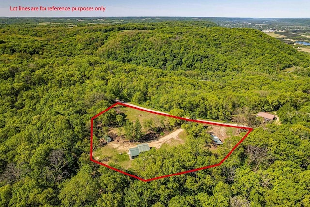 17785 Circle Dr, Boscobel, WI 53805 - aerial view of property and surrounding area featuring a heavily wooded area and property boundaries highlighted