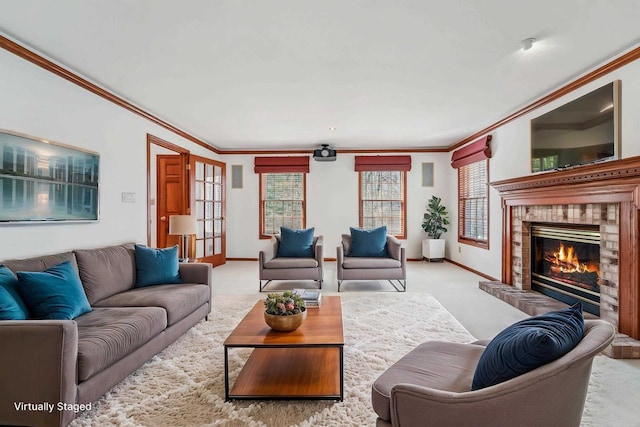 79 Oakridge Ct, Fond Du Lac, WI 54937 - living area featuring ornamental molding, a glass covered fireplace, light carpet, and baseboards