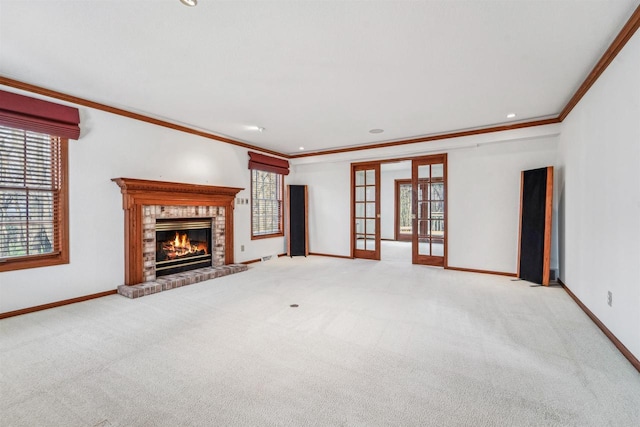 79 Oakridge Ct, Fond Du Lac, WI 54937 - unfurnished living room with ornamental molding, french doors, healthy amount of natural light, baseboards, and recessed lighting