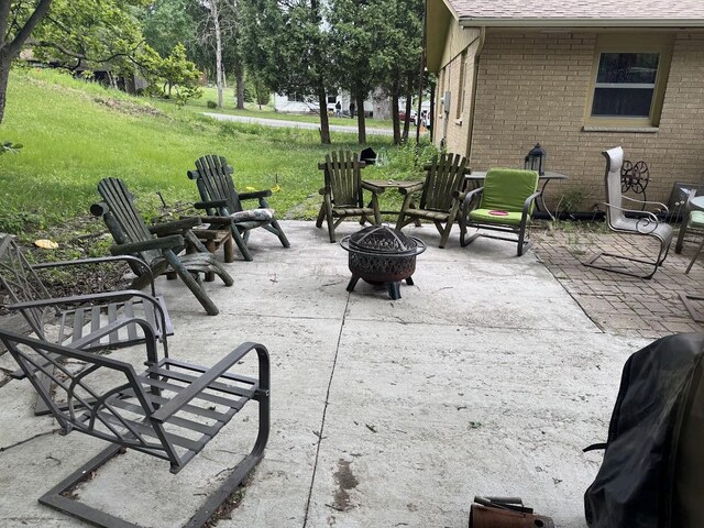 1306 Grandview Ave, Oconomowoc, WI 53066 - view of patio / terrace featuring a fire pit