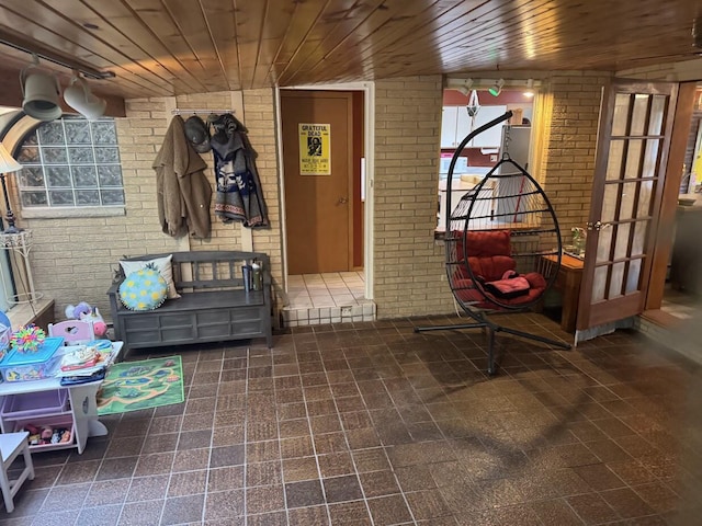 1306 Grandview Ave, Oconomowoc, WI 53066 - mudroom with brick wall and wooden ceiling