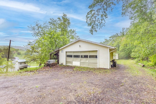 W3703 Scotch Coulee Rd, West Salem, WI 54669 - detached garage with central AC unit