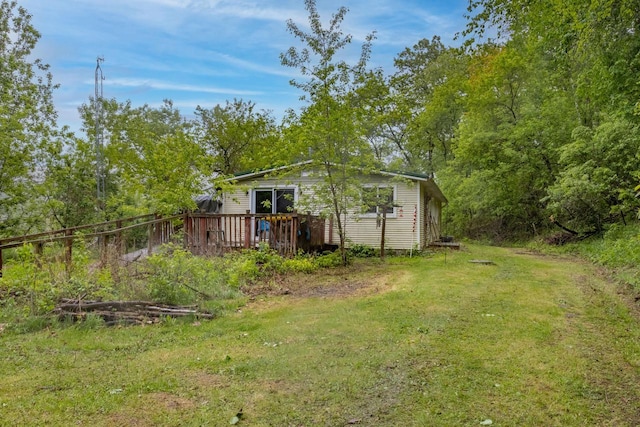 W3703 Scotch Coulee Rd, West Salem, WI 54669 - view of grassy yard featuring a deck