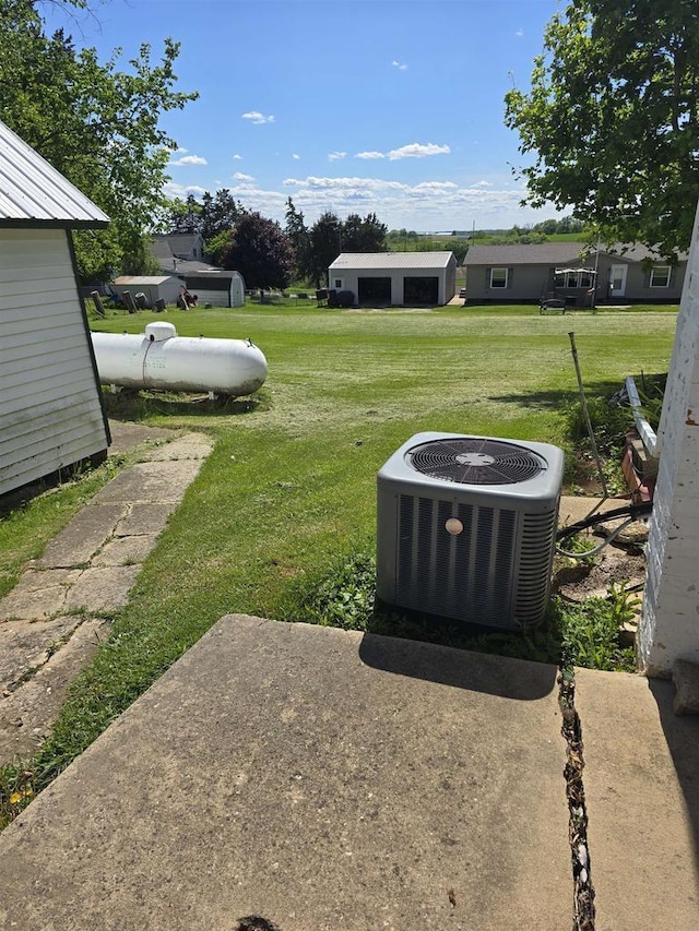 4027 Creamery St, Stitzer, WI 53825 - view of grassy yard with central air condition unit