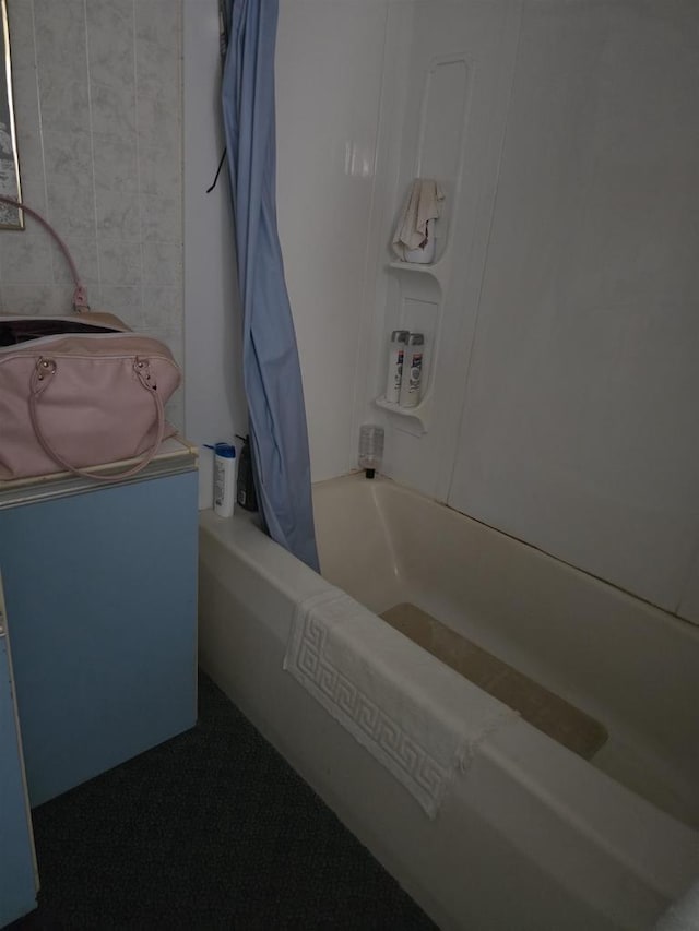 4027 Creamery St, Stitzer, WI 53825 - bathroom with shower / bathtub combination with curtain