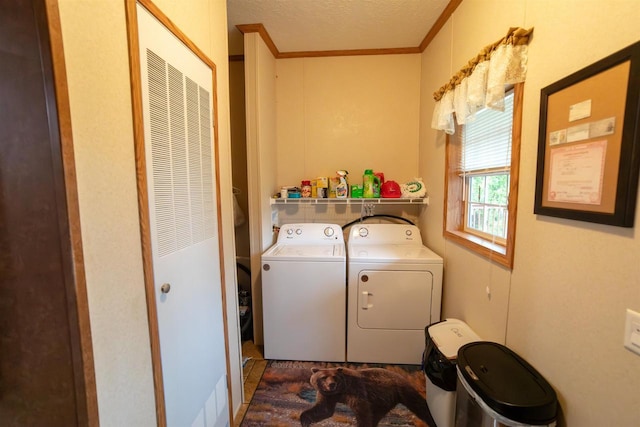 W7744 County Rd E, Westfield, WI 53964 - laundry area featuring independent washer and dryer, a heating unit, ornamental molding, and a textured ceiling