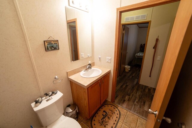 W7744 County Rd E, Westfield, WI 53964 - half bath featuring vanity and toilet