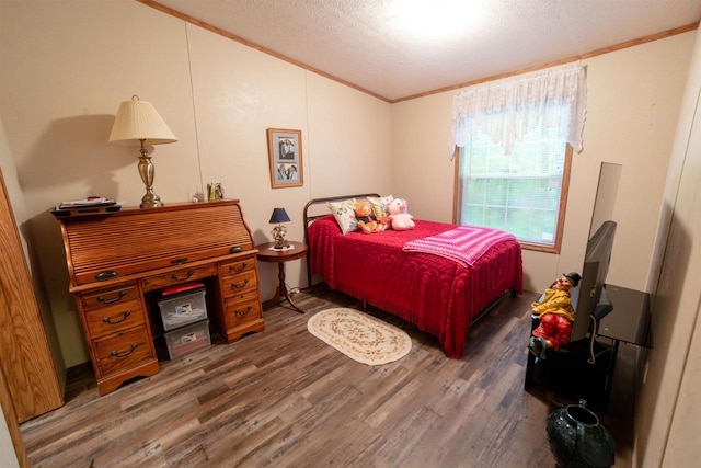 W7744 County Rd E, Westfield, WI 53964 - bedroom featuring crown molding, wood finished floors, a textured ceiling, and lofted ceiling