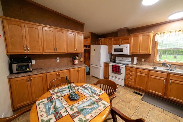 W7744 County Rd E, Westfield, WI 53964 - kitchen featuring white appliances, a sink, and decorative backsplash