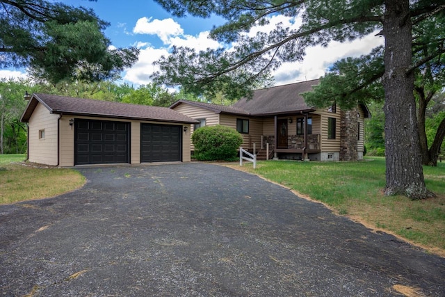 N12124 12th Ave, Necedah, WI 54646 - ranch-style home with a front yard and an outdoor structure