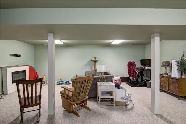 739 Veronica St, Chippewa Falls, WI 54729 - finished below grade area featuring carpet floors, an office area, and a glass covered fireplace