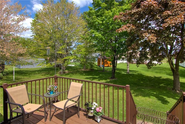 739 Veronica St, Chippewa Falls, WI 54729 - wooden terrace featuring a lawn
