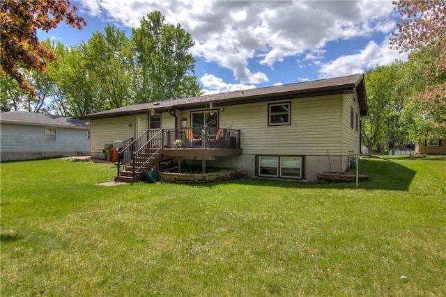 739 Veronica St, Chippewa Falls, WI 54729 - rear view of house featuring a yard and a wooden deck