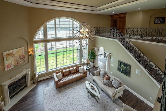 18290 Prairie Falcon Ln, Brookfield, WI 53045 - living area with a chandelier, plenty of natural light, and wood finished floors