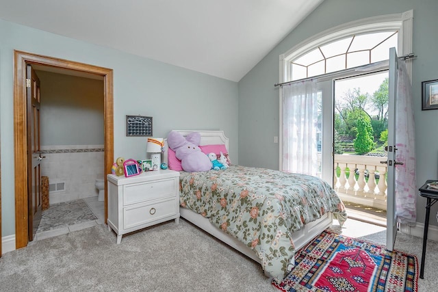 18290 Prairie Falcon Ln, Brookfield, WI 53045 - bedroom featuring lofted ceiling, access to exterior, light carpet, and ensuite bathroom