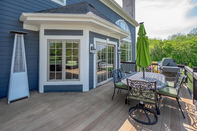 18290 Prairie Falcon Ln, Brookfield, WI 53045 - wooden deck featuring outdoor dining area and grilling area