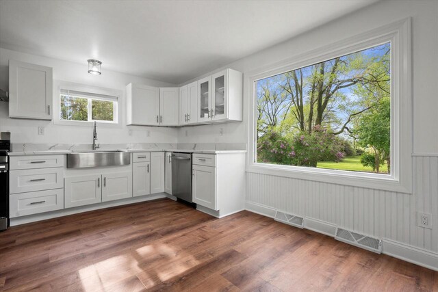 10104 Washington Ave, Mount Pleasant, WI 53177 - kitchen featuring a sink, stainless steel appliances, white cabinets, glass insert cabinets, and dark wood-style flooring