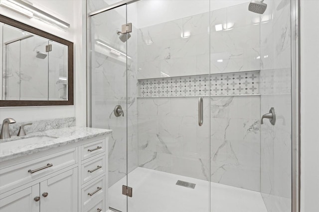 10104 Washington Ave, Mount Pleasant, WI 53177 - bathroom with vanity and a marble finish shower
