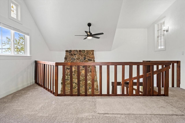 10104 Washington Ave, Mount Pleasant, WI 53177 - corridor featuring carpet, an upstairs landing, lofted ceiling, and baseboards