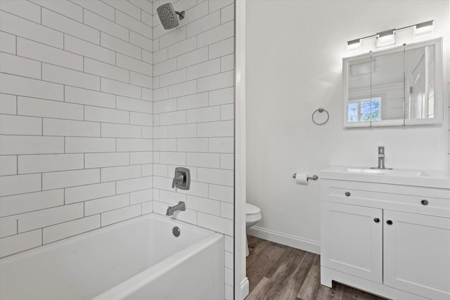 10104 Washington Ave, Mount Pleasant, WI 53177 - full bathroom featuring toilet, vanity, wood finished floors, bathtub / shower combination, and baseboards