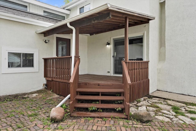 10104 Washington Ave, Mount Pleasant, WI 53177 - entrance to property with stucco siding and a deck