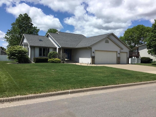 2706 Pleasant Dr, Holmen, WI 54636 - view of front facade with an attached garage, concrete driveway, roof with shingles, and central AC