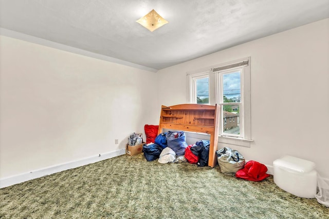 2301 W High St, Racine, WI 53404 - unfurnished bedroom with carpet and baseboards