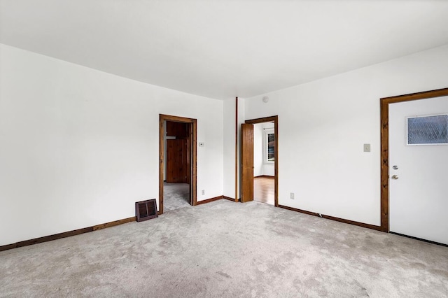 2301 W High St, Racine, WI 53404 - carpeted empty room featuring baseboards