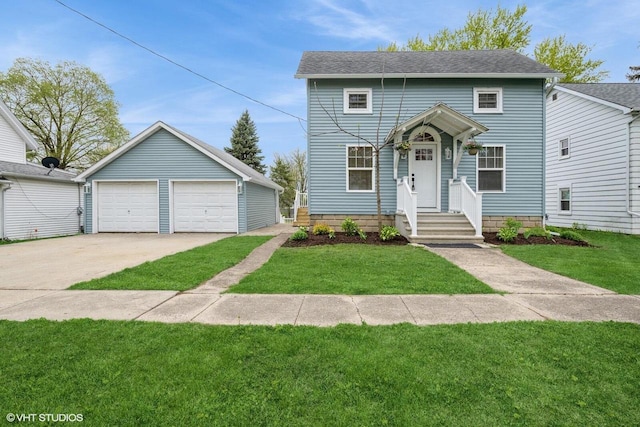 301 Maple Ave, Clinton, WI 53525 - view of front of house featuring a detached garage, an outdoor structure, a front yard, and roof with shingles