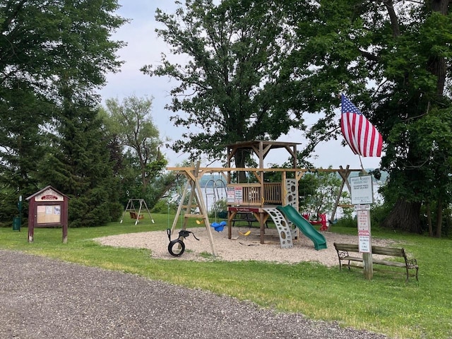 W3794 Beaver Dr, Lake Geneva, WI 53147 - communal playground featuring a lawn